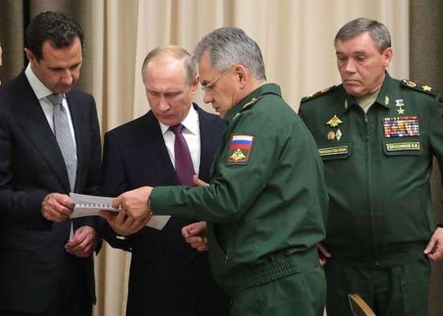بوتين خلال تعريفه الأسد بالجنرالات الروس الذين أنقذوا سورية: نهاية الإرهاب قريبة