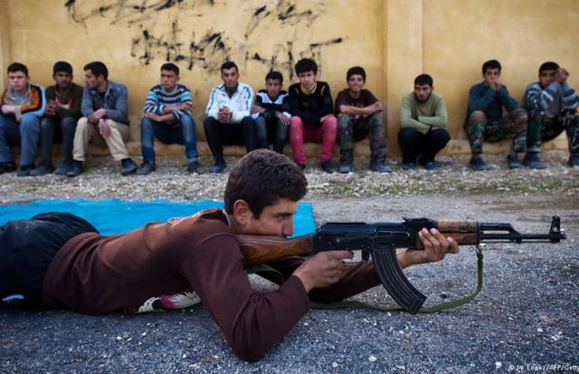 الجنود الأطفال.. سلاح في قبضة ميليشيات داعش