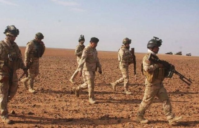 القوات العراقية تحاصر تكريت وسط معارك عنيفة
