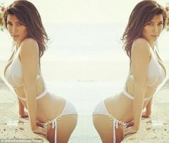 كيم كارداشيان تنشر صورة مزدوجة في البكيني