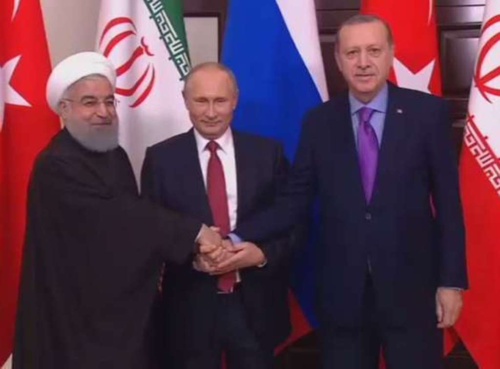 قمة سوتشي.. بوتين يدعو أردوغان وروحاني إلى وضع برنامج لإعادة إعمار سورية