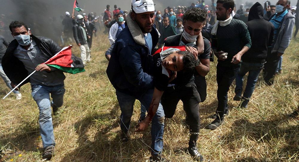 الصحة الفلسطينية: 1143 إصابة بجراح واختناق بالغاز في مواجهات مع الجيش الإسرائيلي