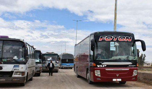 إخراج 122 حافلة تقل مئات الإرهابيين وعائلاتهم من ريفي حمص الشمالي وحماة الجنوبي ونقلها إلى شمال سورية