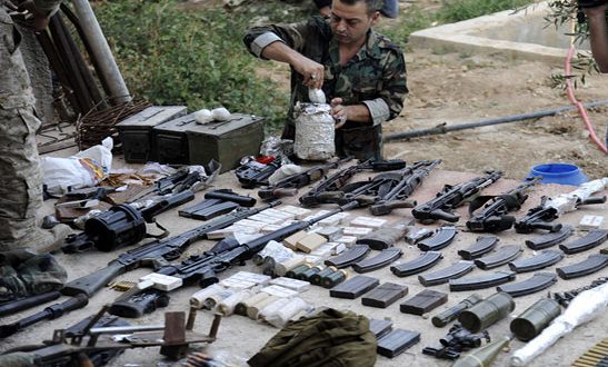 أسلحة وذخائر من مخلفات الإرهابيين بعضها أمريكي في بلدة يلدا جنوب دمشق