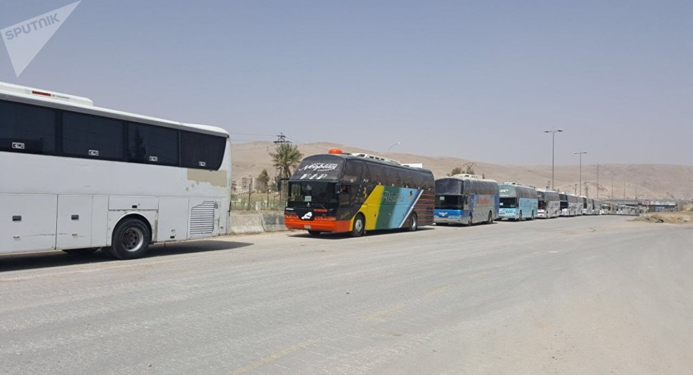 تواصل تجهيز الحافلات لإخراج الدفعة الخامسة من الإرهابيين وعائلاتهم من يلدا وببيلا وبيت سحم لنقلهم إلى شمال سورية